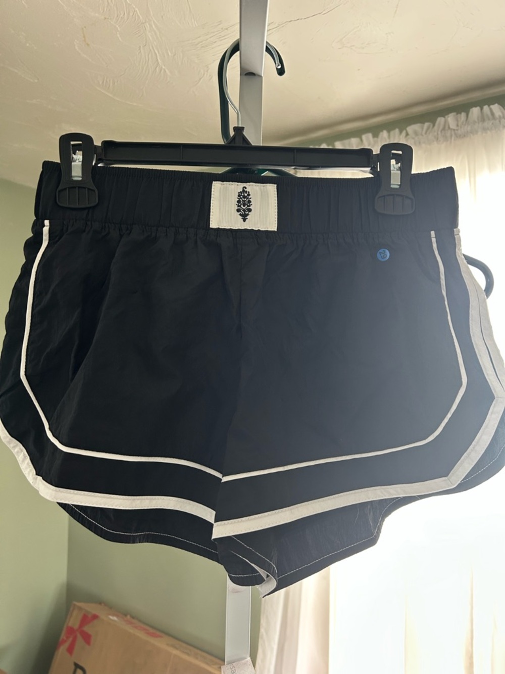 Free People Varsity Blue shorts in black with white trim